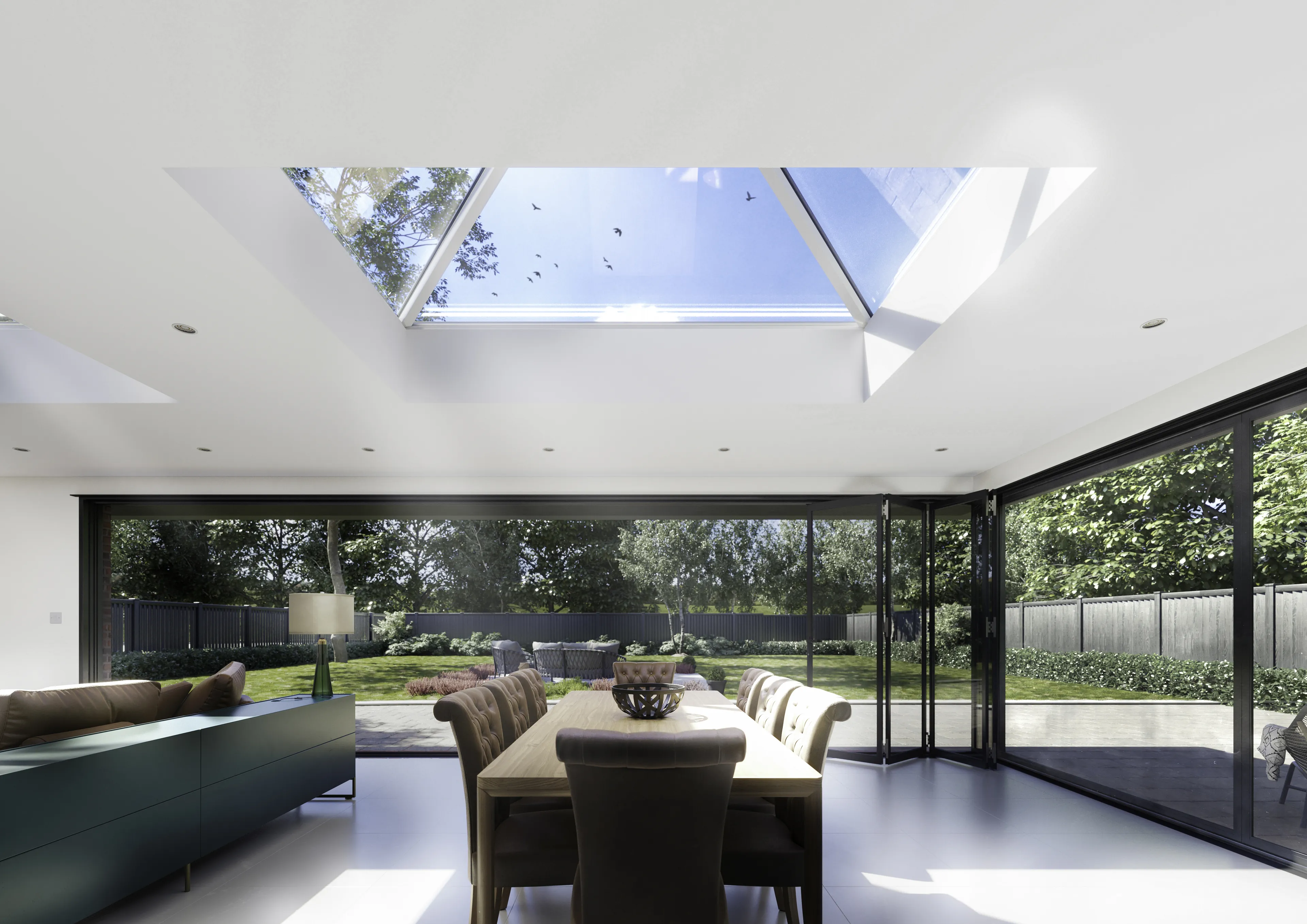 Roof lantern over a bright modern living room opening onto a landscaped garden